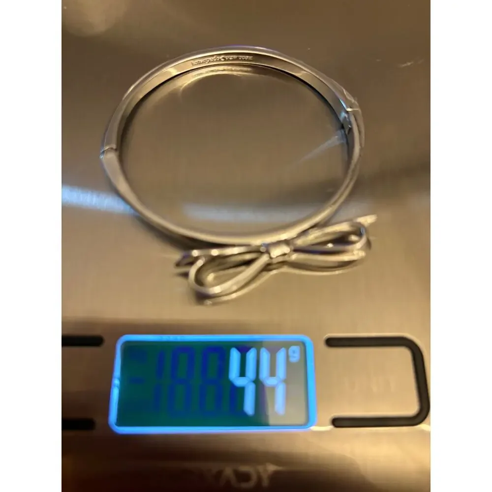 Kate Spade Silver Tone Bow Hinged Bangle Size 7